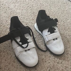 White and Black lifting Shoes